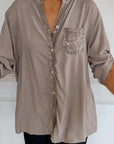 Paneled sequin button casual top