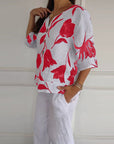 Floral print cotton and linen button-down top