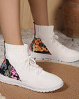 Lilia – Comfortable mid-high sneakers with floral detail on the heel