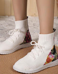 Lilia – Comfortable mid-high sneakers with floral detail on the heel